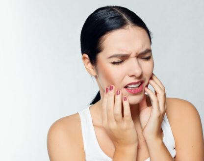 Lady having teeth pain 